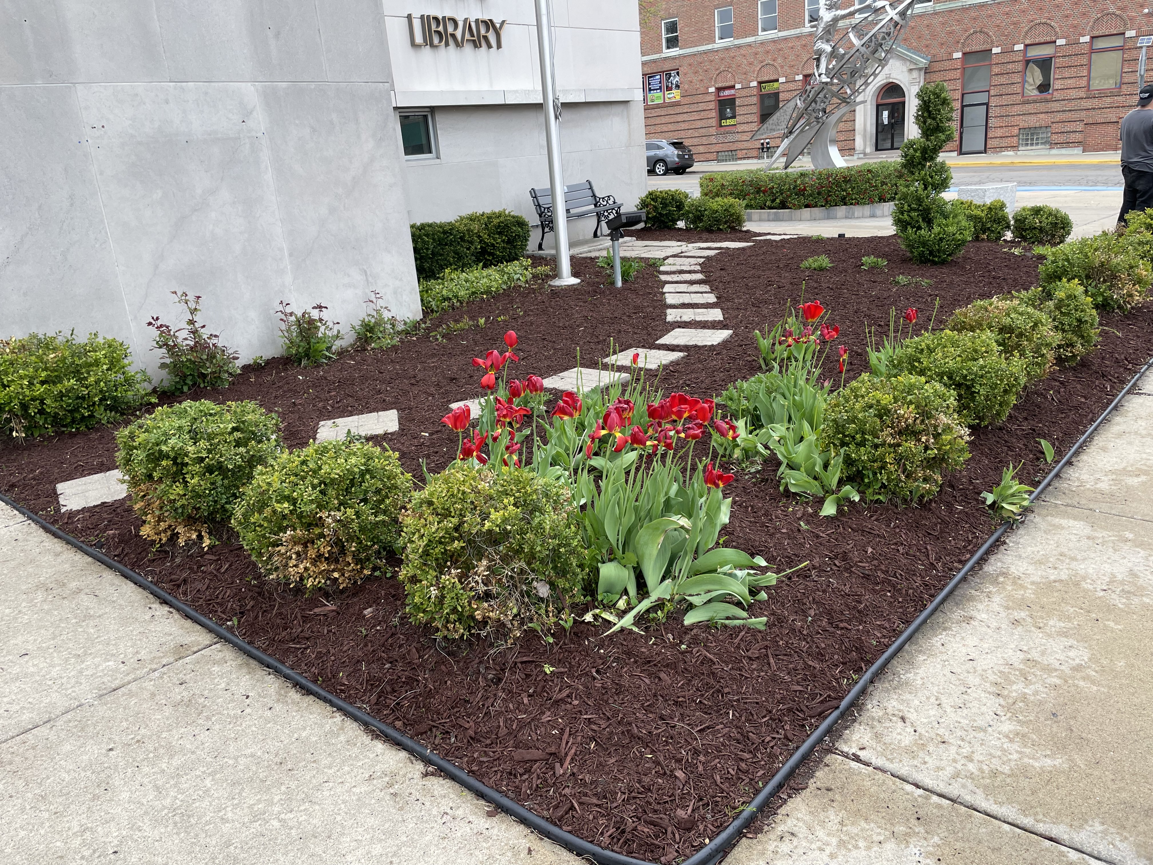 Clean striped walkway lawn care and property maintenance